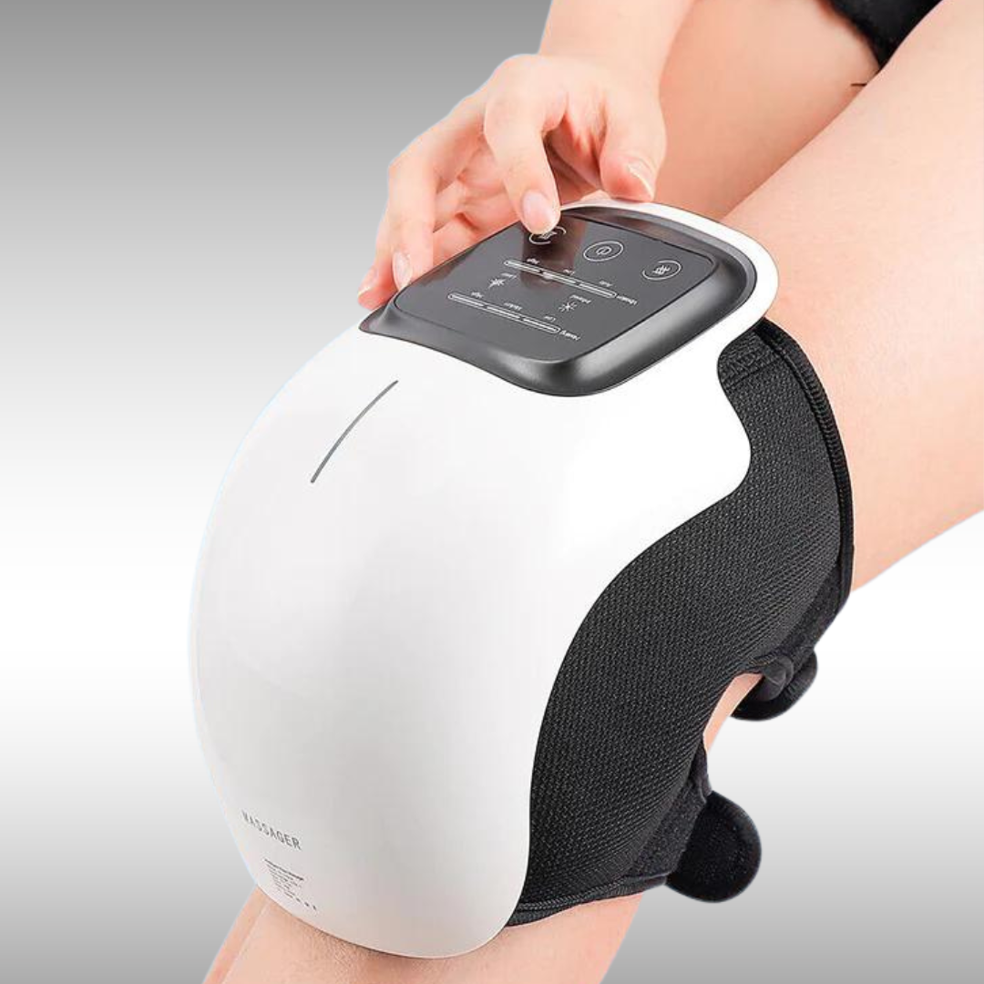 Image of NuLYFF™ Knee Massager on a women's leg. She is enjoying the red light therapy, heat therapy, and high frequency vibration massage therapy as she is getting the relief. She is pressing buttons to adjust the settings for here preferred relief.